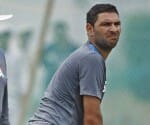 Indian player plays football barefoot during training session