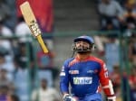 Dinesh Karthik throws bat in air