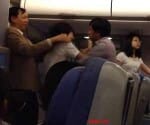 man tore clothes of fellow passengers in flight.