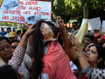 Protest by women congress against hema malini's insensitive comment on widows.