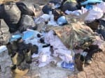cloths and boots of the dead CRPF personnel found in garbage.