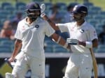 Murali Vijay consoled by Captain Virat Kohli.