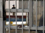 Why warden and assistant Supritendent throw mobile and tobacco in jail?