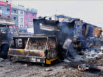 gujrat violence Curfew lifted from three areas 