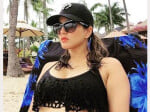 Sunny Leone in Black Bikini at poolside