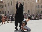 ISIS execute a 15-year-old boy by beheading after he is caught listening to western music in Iraq 