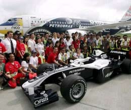 young excited to see  formula one race 