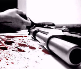 former district chief and his son shot dead