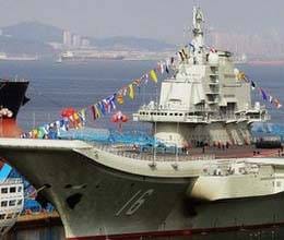china shows power through aircraft carrier 