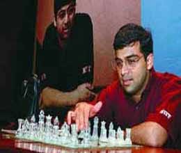 viswanathan anand held by fabiano caruana slips to joint third