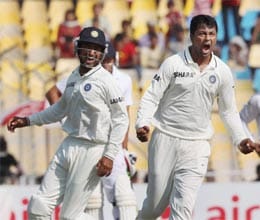 Ojha and Pujara hero of nine wicket win
