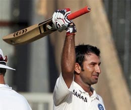pujara completes his century in sehwag style
