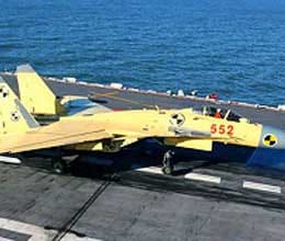 china conducts first landing on aircraft carrier