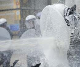 protesting farmers spray european parliament with milk