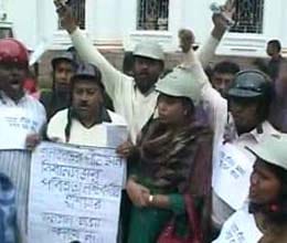 congress lawmakers wear helmets to west bengal Assembly