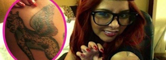 Snooki flaunts new 'leopard' tattoo
