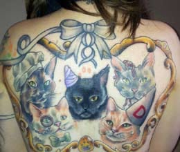 cat lover tattoos pictures of five dead cats on her back