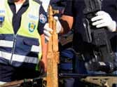 golden gun seized by honduras police