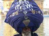 nihang man make 300 m long turben on maghi mela in india