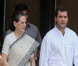 poster of soniya gandhi, rahul and manmohan singh have been black