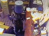 burglar improvises with bucket after forgetting mask