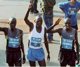 ugandan Kiprop, Kenyan Valentine set new mumbai marathon marks