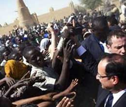 terrorism is not over in mali says french president 