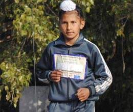 nine year old karanveer wins under fifteen marathon
