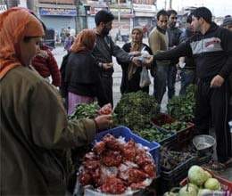 kashmir limping back to normalcy after afzal gurus hanging