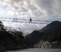 haldvani village childrens cross risky damage bridge on river