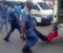 worker shot dead during police beat in south africa