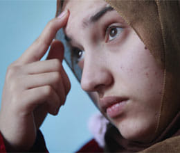 innocent girl scarred that narrate a story of iraq