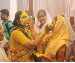 Widows celebrate holi by Radha- Krishna 