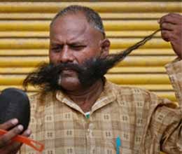 man with long moustache popular in up