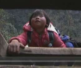 Children takes risk of cmilb on 70m ladders for school in china
