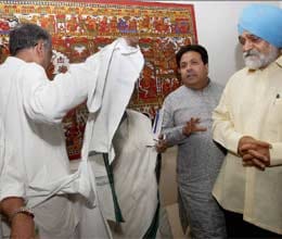 west bengal finance minister ballyragging torn shirt