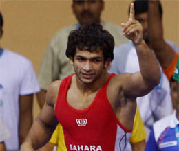 amit wins gold, three other indians bag a bronze each
