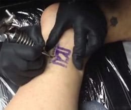 company offers employees to pay rise for getting tattoo of logo