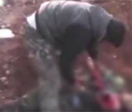 syrian rebel eats the heart of army soldier 