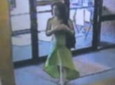 bank robber in green dress 