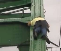 drunk man climbs on a bridge and falls asleep
