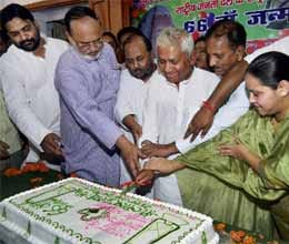 66 pound cake cut on lalu's 66th birthday