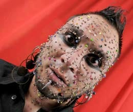 the most piercings on the face