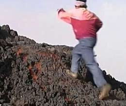 man walking in lava