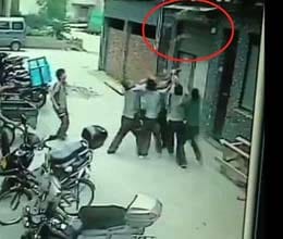 chinese girl caught by passers-by