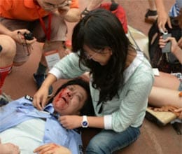 chinese injured in beckham stampede