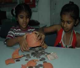 girl deposited her piggy bank money for disaster victims