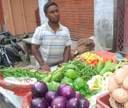 national player selling vegetables