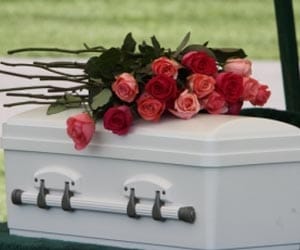 Thief digs up baby's grave, steal her clothes