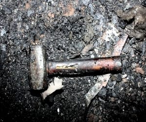 son stabbed in the head of father to hammer